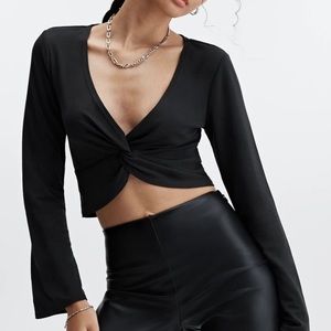 NWT Fabletics black long sleeve twist front knit top - size M